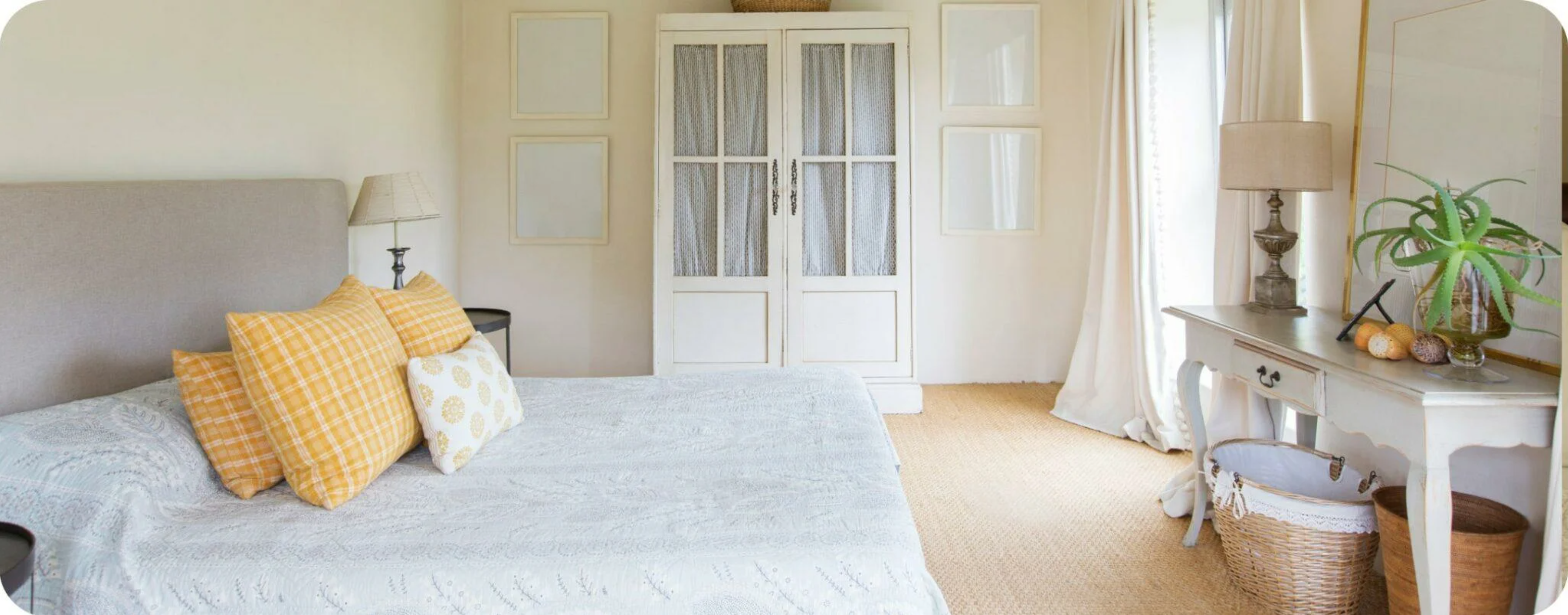 a bedroom with a bed and a cabinet